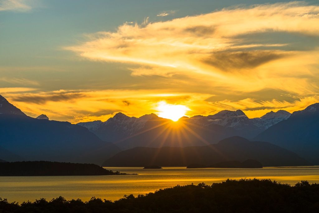The sun sets over Manapouri
